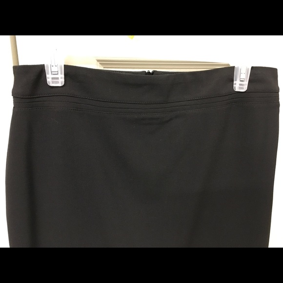 Black, lined, back zip skirt. Never worn. - Picture 3 of 5